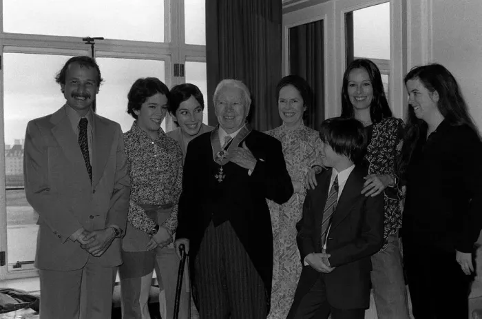 Framed Print : Charlie Chaplin with family receiving Knighthood 1975 with wife Una Framed Print : Charlie Chaplin with family receiving Knighthood 1975 with wife Una