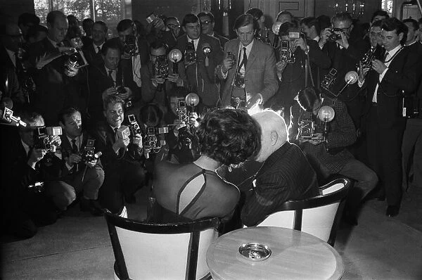 Charlie Chaplin Silent Movie Star Comedy Actor with Sophia Loren Actress at a press