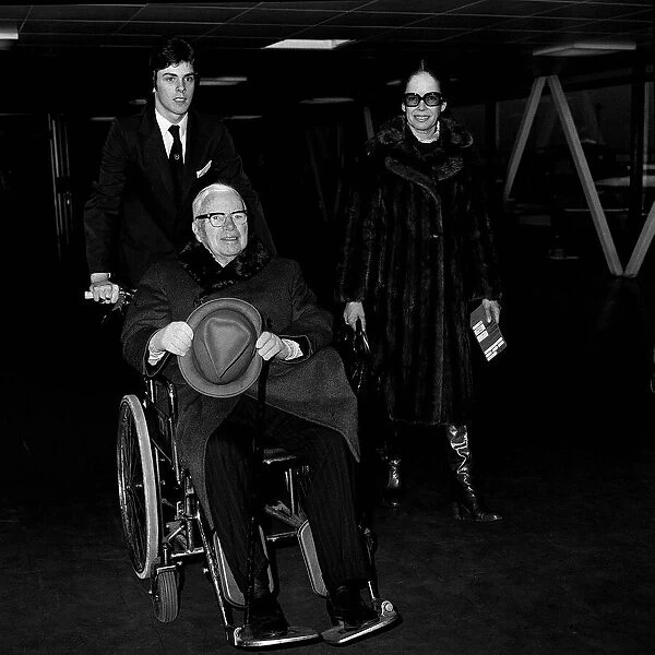 Charlie Chaplin with wife Una at London Airport 1975