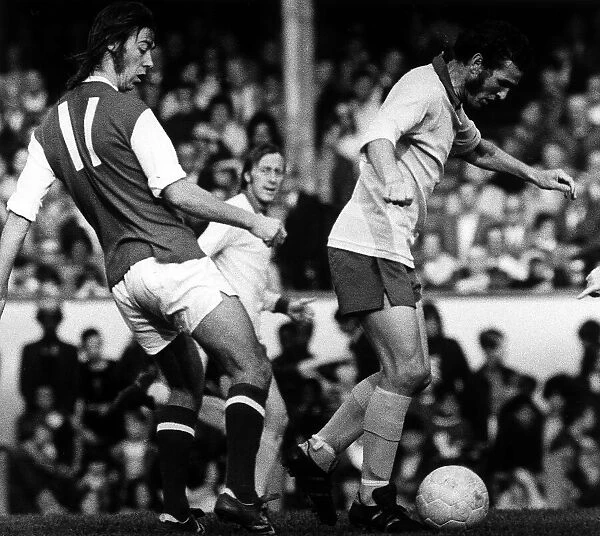 Charlie George Football Player Arsenal 1972 loses out to terry paine during an