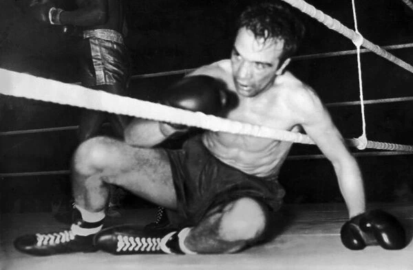Charlie Hill boxer December 1957 Scots boxer against the ropes during fight