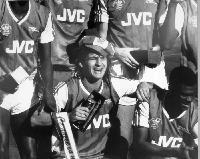 Framed Print : Charlie Nicholas of Arsenal celebrates his double in the Littlewood Framed Print : Charlie Nicholas of Arsenal celebrates his double in the Littlewood
