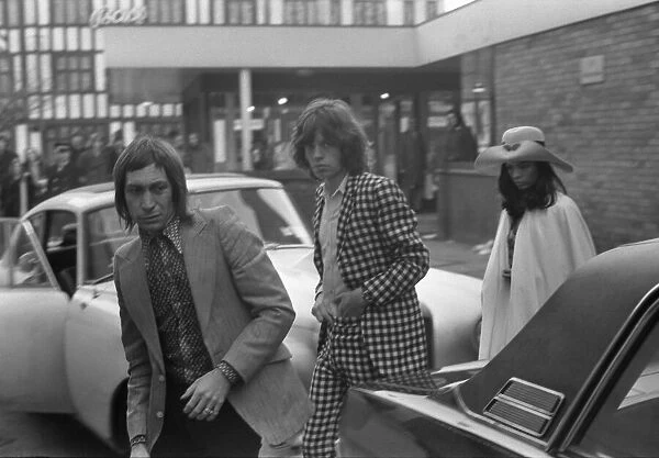 Charlie Watts, Mick Jagger and his girlfriend Bianca De Macias arrive at Coventry Theatre