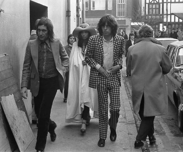 Charlie Watts, Mick Jagger and his girlfriend Bianca De Macias arrive at Coventry Theatre