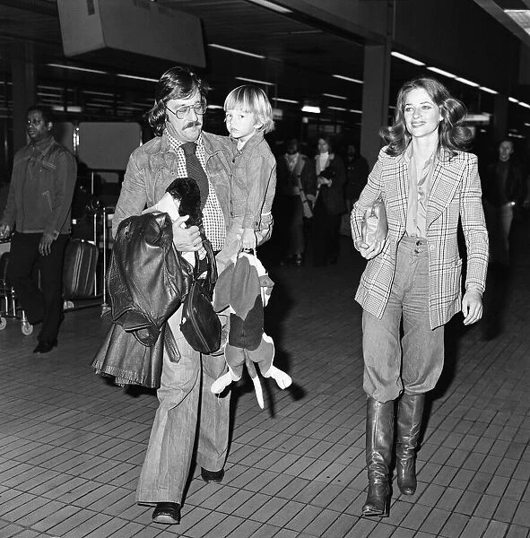 Charlotte Rampling at Heathrow Airport with her son Barnaby and husband Bryan Southcombe