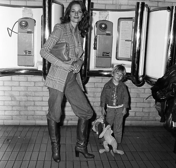 Charlotte Rampling at Heathrow Airport with her son Barnaby. 6th March 1976