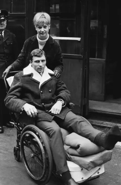 Framed Print : Charlton Athletic footballer Mike Bailey returns to London with his wife after breaking