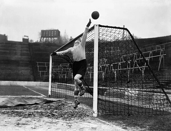 Charlton Athletic goalkeeper Sam Bartram tips a shot over the bar during a training