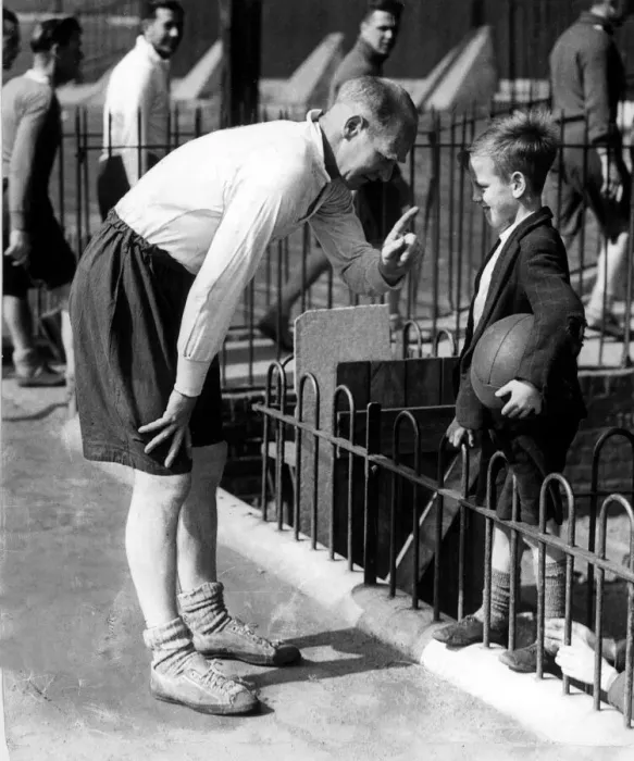 Framed Print : Charlton Athletic manager Don Welsh has a word with a young football fan before taking Framed Print : Charlton Athletic manager Don Welsh has a word with a young football fan before taking
