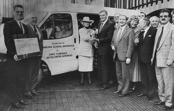 Charlton Heston gave the keys of an £11, 500 minibus to Norman Border