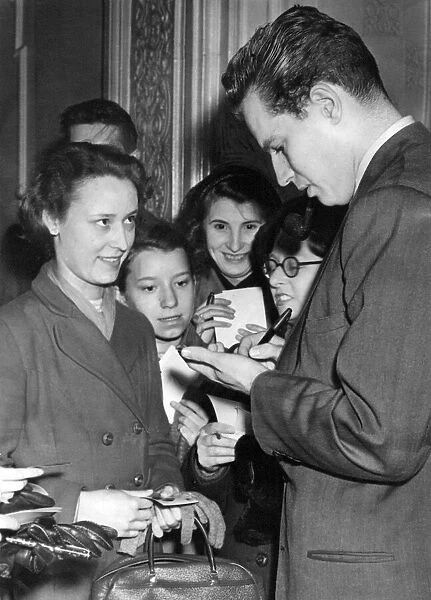 Charlton Heston signs autographs for his adoring fans in Newcastle