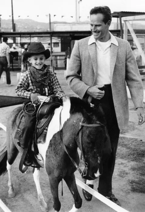 Framed Print : Charlton Heston with a young boy on a horse