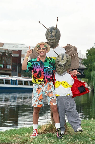 Chart topper Timmy Mallett with two martians sporting itsy bitsy bikinis