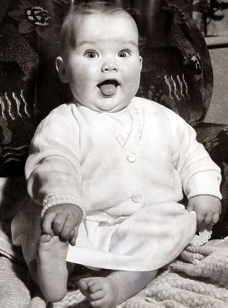 Cheeky little baby girl, circa 1950