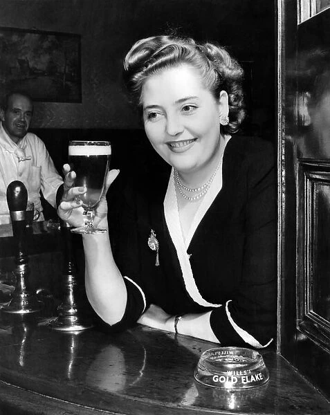 Cheers Miss Violet Wittey, barmaid of the Rose and Crown, Park Lane