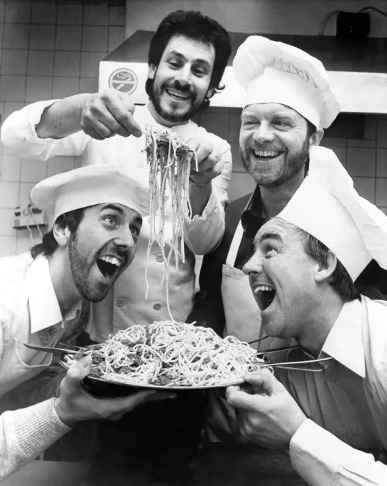 Framed Print : Chef Felicetti Emidio (second left) passes on tips to Anthony Smith Framed Print : Chef Felicetti Emidio (second left) passes on tips to Anthony Smith