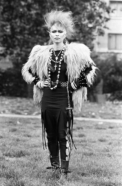 Chelsea fashion designer Jane Kahn models her designs. 2nd October 1983