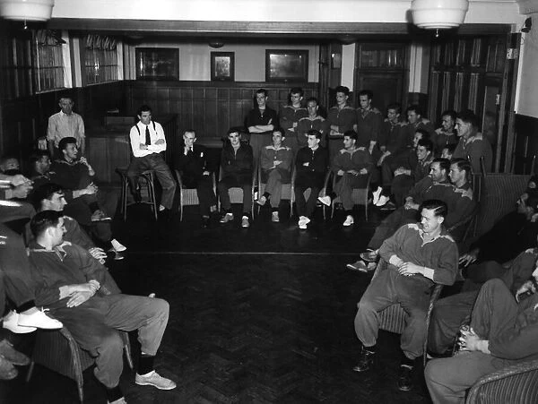 Chelsea FCs New Manager Ted Drake talks with his players at the start of the new