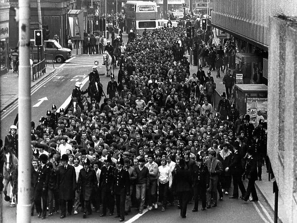 Chelsea football fans are escorted along New Bridge Street in Newcastle by police 27