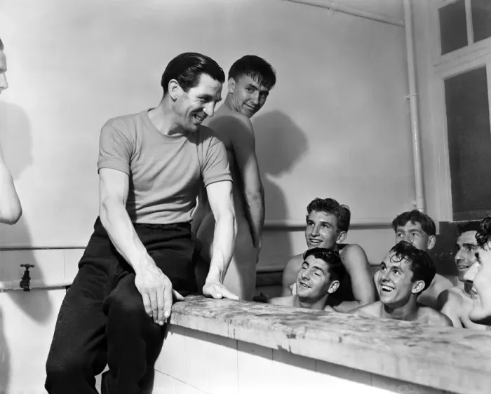 Framed Print : Chelsea football manager Ted Drake talking to his players in the bath