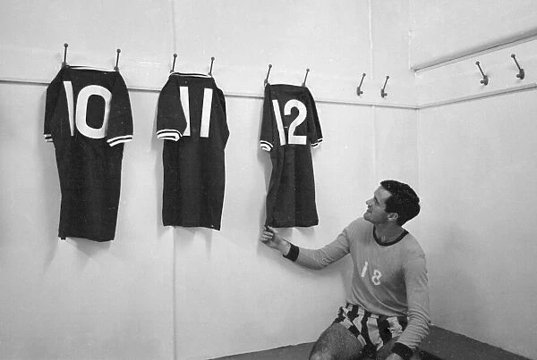 Chelsea footballer George Graham in the dressing room at Stamford Bridge with the number