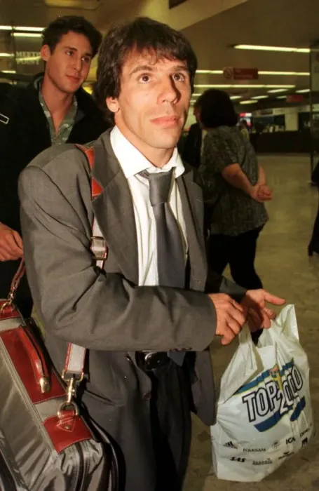 Framed Print : Chelsea footballer Gianfranco Zola at Heathrow Airport as the team arrives back Framed Print : Chelsea footballer Gianfranco Zola at Heathrow Airport as the team arrives back