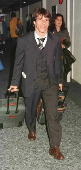 Framed Print : Chelsea and Italy footballer Gianfranco Zola arriving at Heathrow airport after England Framed Print : Chelsea and Italy footballer Gianfranco Zola arriving at Heathrow airport after England