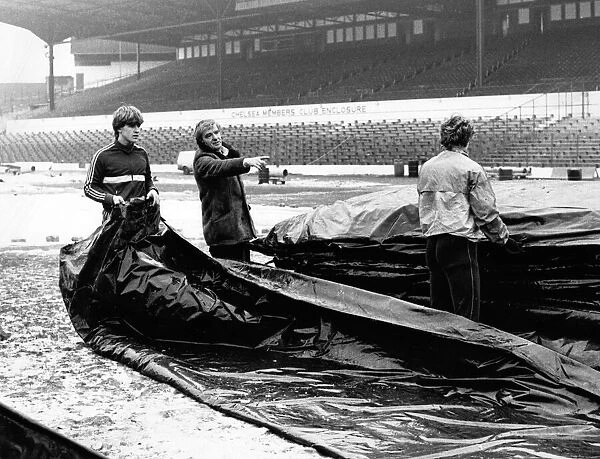 Chelsea manager John Neal with his ground staff at Stamford Bridge