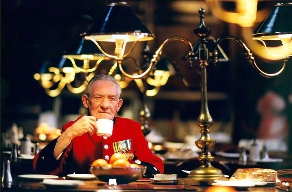 Chelsea Pensioner Fen Davison in the Great Hall, dining room at The Royal Hospital