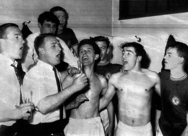 Chelsea players celebrate automatic promotion back to Division 1 after finishing 2nd in