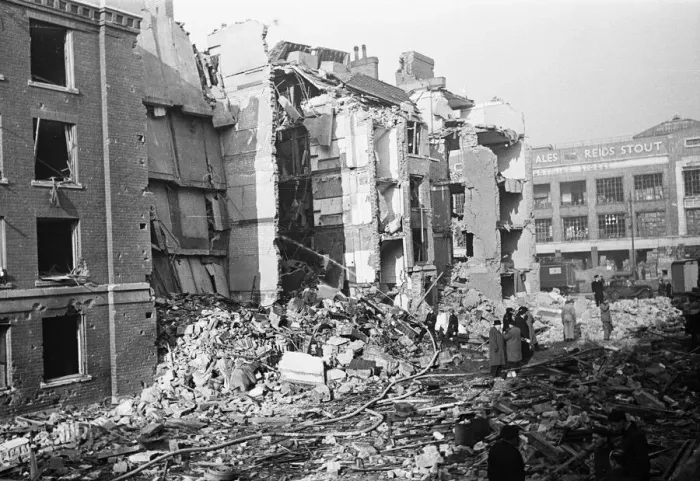 Framed Print : Chelsea residents with the few belonging salvaged from their bombed out following a raid