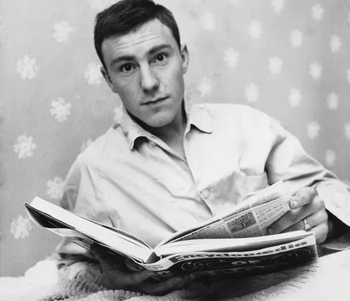 Framed Print : Chelsea striker Jimmy Greaves relaxing reading a book. 26th February 1960 Framed Print : Chelsea striker Jimmy Greaves relaxing reading a book. 26th February 1960