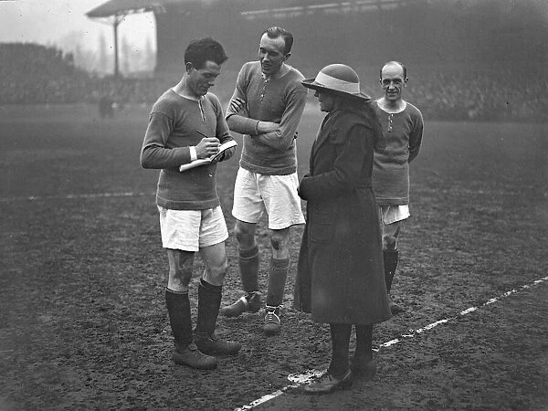 Chelsea v. Newcastle. Chelsea players signing autograph book. 7th February 1921