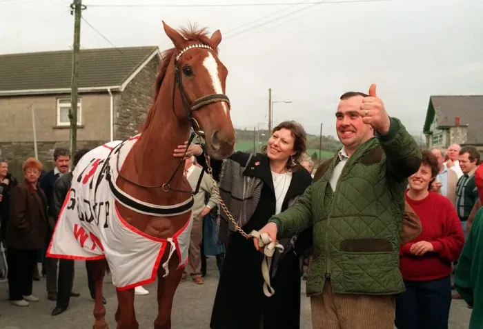 Framed Print : Cheltenham Gold Cup winner Nortons Coin during celebrations in his village after the race