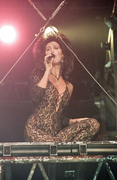 Cher, American singer performing on stage, during Heart of Stone Tour