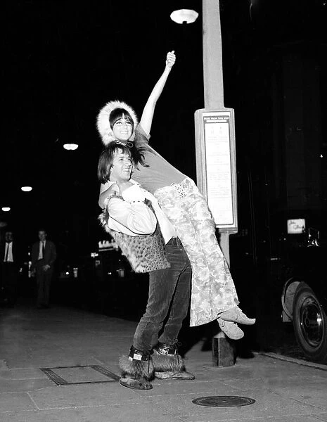 Cher and Sonny at bus stop August 1965