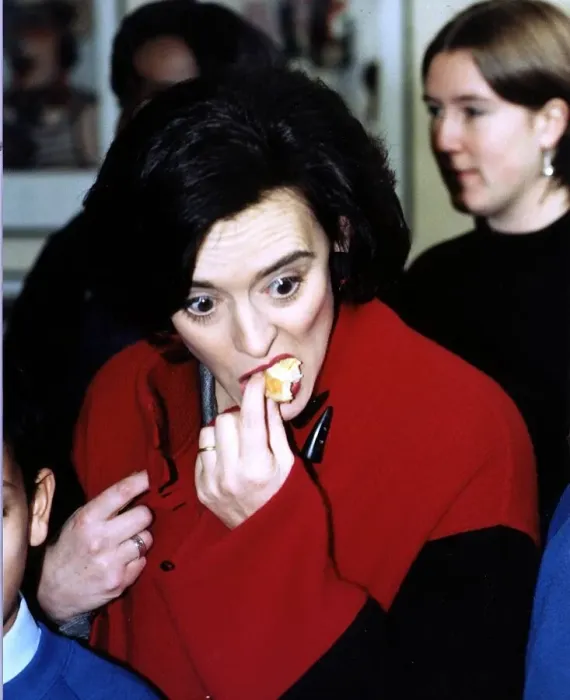 Framed Print : Cherie Blair wife of Labour MP Tony Blair seen eating a cake at a school in Fulham in aid