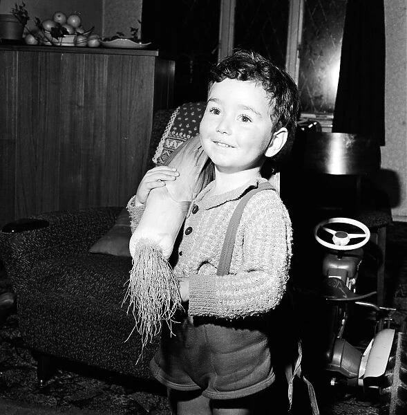 Child holds prize winning leek 2nd October 1965
