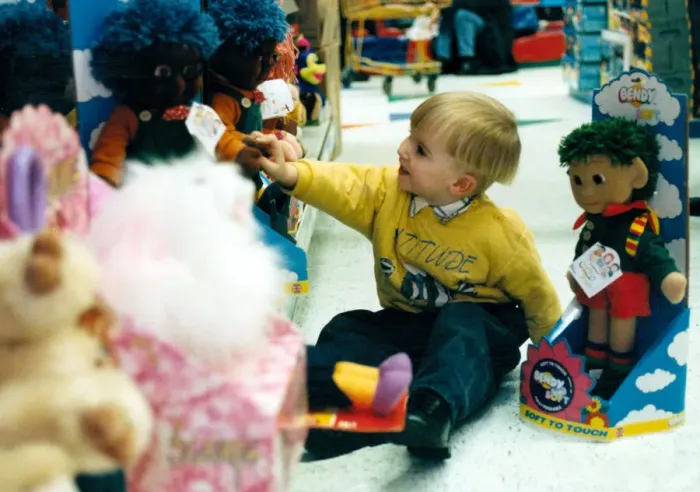 Framed Print : Child, Lewis Cromby aged 3, explores Bendy Soft toy during pre christmas shopping trip Framed Print : Child, Lewis Cromby aged 3, explores Bendy Soft toy during pre christmas shopping trip