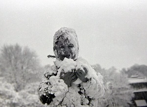 Child playing in the snow after a heavy fall at Hampstead Heath January 1945
