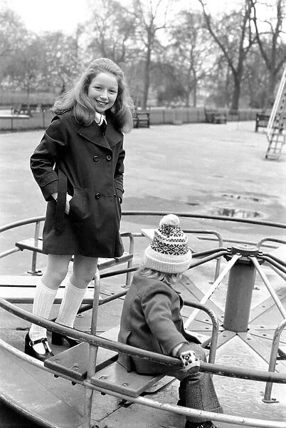 Child: Singer: Lena Zavaroni enjoying herself in Green Park, London. March 1975 75-01376