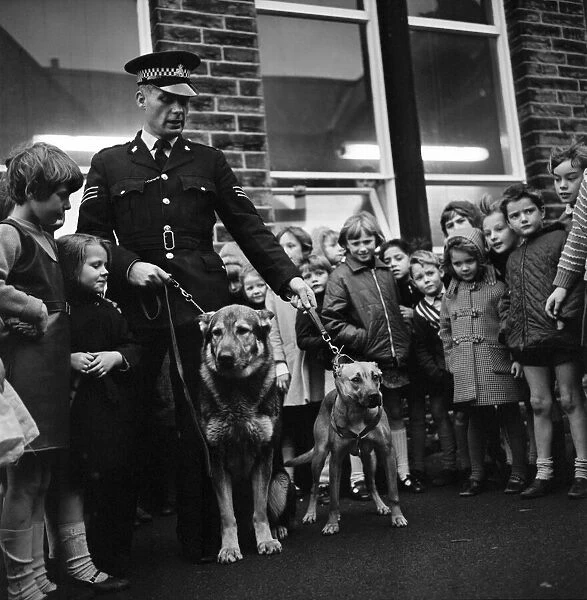 Children with animals dogs. Spencer of the Buraley police shows children of Primet