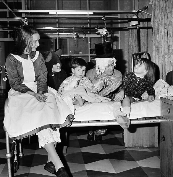 Children of Booth Hall Hospital meet character from Alice in Wonderland: Donna George, 5