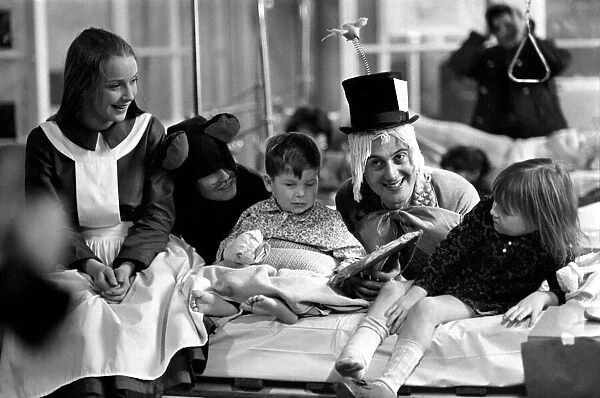 Children of booth hall hospital meet character from Alice in Wonderland: Donna George, 5