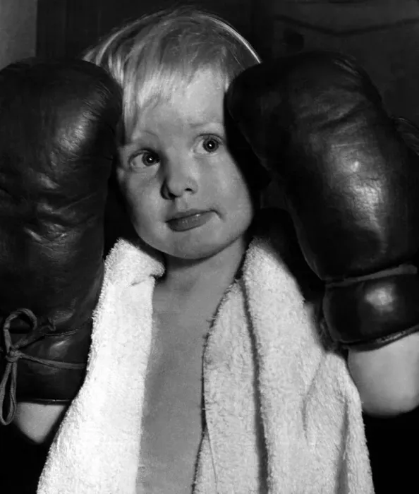 Framed Print : Children - Boys Boxing Young boy wearing boxing gloves, towel around his neck