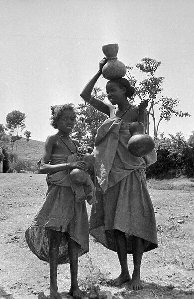 Children carrying water jars on the banks of the Nile near to Cairo Circa 1935