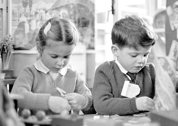 Children in classroom at Ravensdale Infants school, Coventry