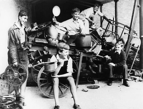 Children collecting scrap metal prior to the out-break of World War Two. Circa 1939