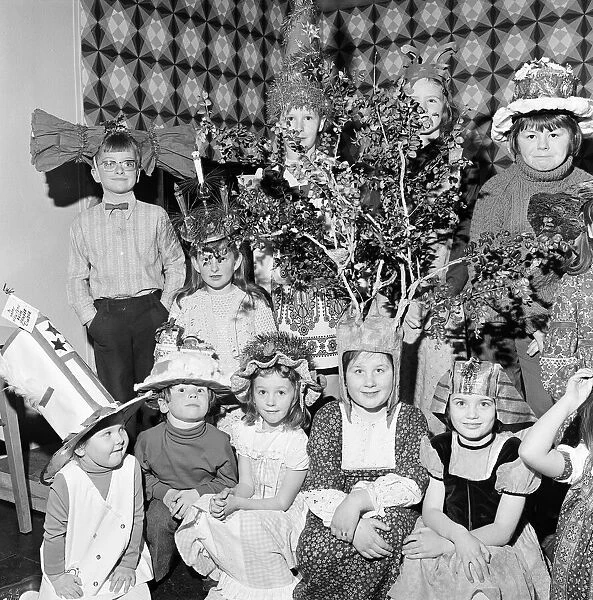 Children compete in a Fancy Hat Competition, Teesside, North East England, January 1974