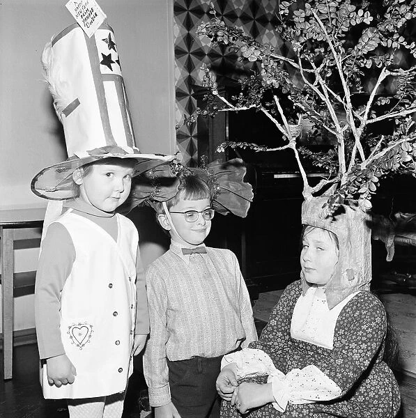 Children compete in a Fancy Hat Competition, Teesside, North East England, January 1974